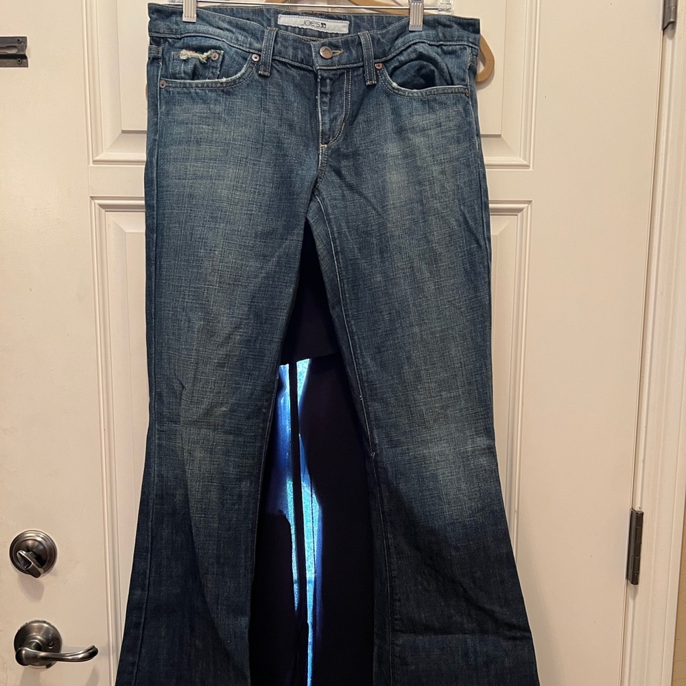 Flared dark denim jeans by Joe’s jeans